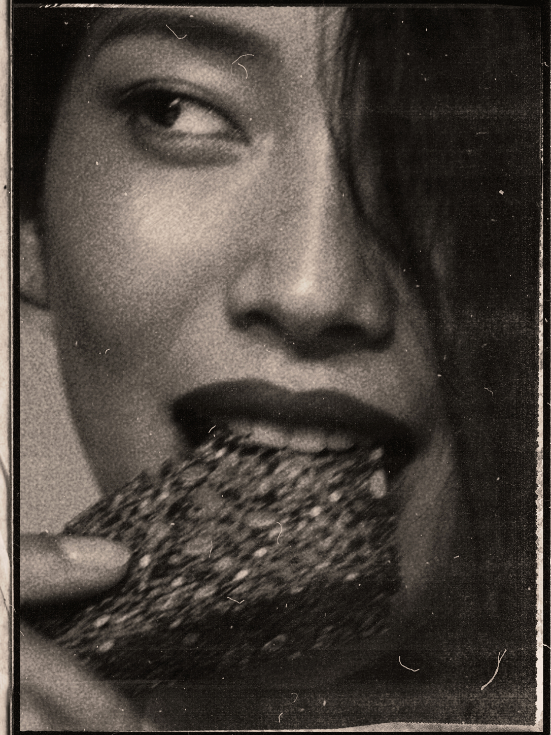Black and white portrait eating vagus seed bread
